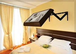 How to hang a TV in the bedroom photo