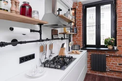 Kitchen interior with pipes on the wall