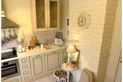 Kitchen interior with pipes on the wall