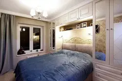 Bedroom Interior With One Window And Door