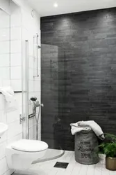 Bath design with gray tiles on the floor