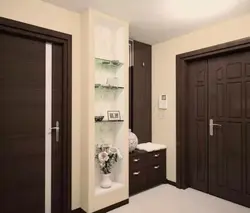Apartment interior with dark doors and light floor