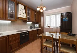 Light Kitchen With Dark Furniture Photo