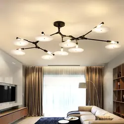 Living room interior with suspended ceiling and lamps and chandelier