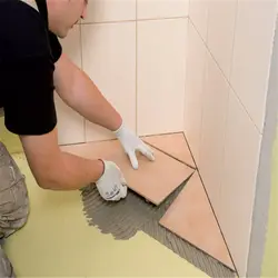 How to lay tiles on the bathroom floor photo