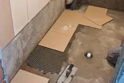 How to lay tiles on the bathroom floor photo