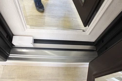 Photo of apartment door threshold
