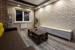 Brick wall in the apartment photo