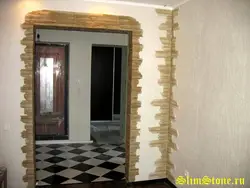 Finishing doorways with decorative stone photo in the apartment