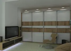 Built-in wardrobes in the living room photo