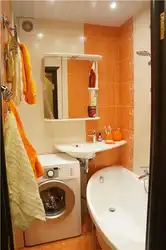 Corner Baths In A Small Bathroom With A Washing Machine Photo
