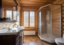 Bath In A Wooden House With A Window Photo