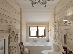 Bath in a wooden house with a window photo