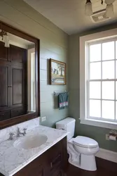 Window in the bathroom in a wooden house photo