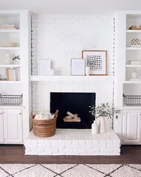 White living room design with fireplace
