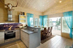 Living room kitchen design in a log house