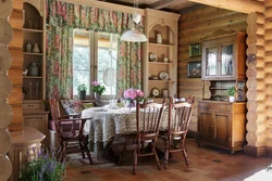 Living room kitchen design in a log house