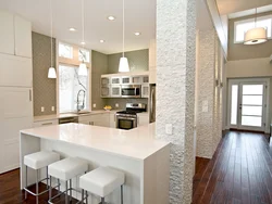 White decorative plaster in the kitchen photo