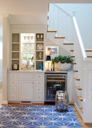 If the stairs are in the kitchen photo