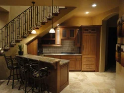 If the stairs are in the kitchen photo