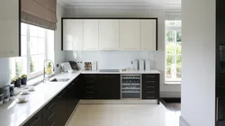 Modern kitchen design with a window in the middle