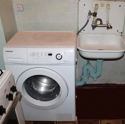 Photo of how to connect a washing machine in the kitchen