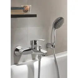 Bathroom faucet with watering can photo