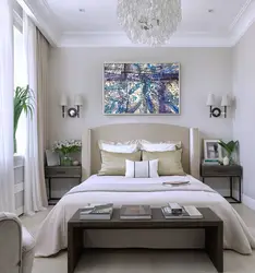 Photo Of A Bedroom With A Flower Above The Bed