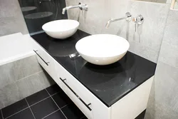 Gray countertop in the bathroom photo