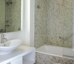 Bathtub design with tiles just above the bathtub
