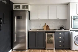 Graphite refrigerator in the kitchen interior