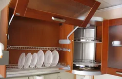 Cupboard dish dryer for the kitchen photo