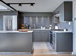 Kitchen interior in a house in gray tones