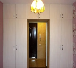Wardrobe as a partition in the hallway photo