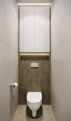 Design of a small toilet in an apartment with a cabinet