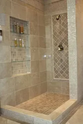 Do-it-yourself shower in an apartment made of tiles without a tray photo