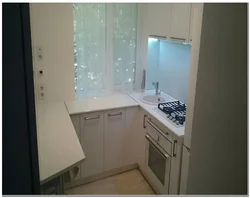 Photo of a 5 m kitchen with a kitchen by the window