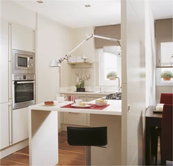 Photo of a 12 square meter kitchen with a bar counter