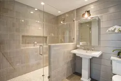 Small bathtub with wall panels photo