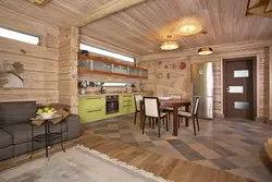 Living room interior with kitchen in wooden style