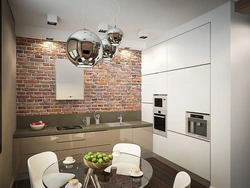 Brick kitchen in apartment photo