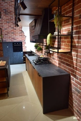 Brick kitchen in apartment photo