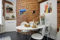 Brick kitchen in apartment photo