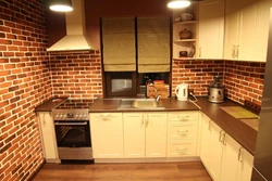 Brick kitchen in apartment photo