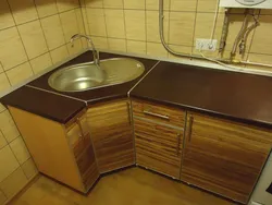 Corner kitchen sink with cabinet photo