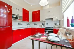 Photo of interiors of red kitchen apartments