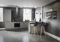 Gray kitchen in the interior combination with the floor