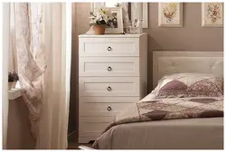 Bedroom interior chest of drawers bed