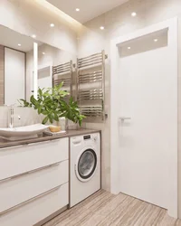 Bathroom Design With Washing Machine In Light Colors