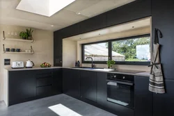 Kitchen design with dark window